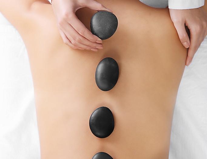 Rocks on a woman’s back